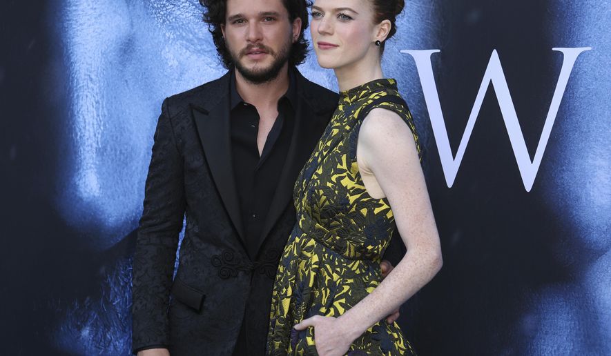 FILE - In this July 12, 2017, file photo, Kit Harington, left, and Rose Leslie arrive at the LA Premiere of "Game of Thrones" at The Walt Disney Concert Hall in Los Angeles. The couple announced their engagement in the Times of London newspaper on Sept. 27, 2017. (Photo by Willy Sanjuan/Invision/AP, File)