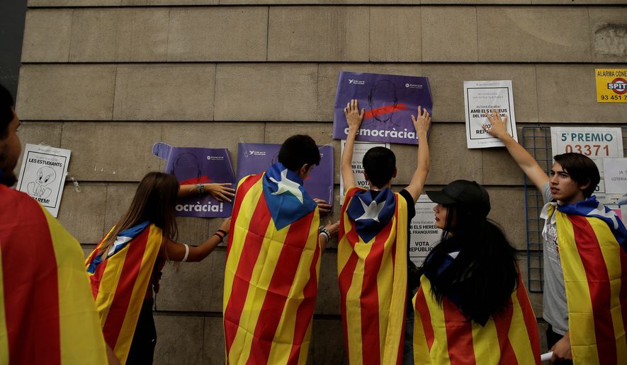 Catalonian separatists say they will go ahead with Sunday&#x27;s poll to secede from Spain and form their own country, a campaign that has drawn an increasing crackdown from the Spanish government. (Associated Press)