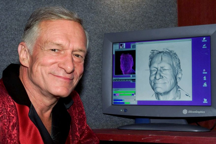 Playboy Enterprises impresario Hugh Hefner poses next to a laser-generated image of his head on a computer screen following a laser scanning session, Tuesday afternoon, Sept. 26, 2000, at the Playboy Mansion in Los Angeles, Calif. The resulting image will be used to create an exact wax model of his head for a figure at the Hollywood Wax Museum. The technology, used here for the first time for a wax figure, is the same type used in the creation of high-tech maps and in the manufacture of mechanical parts for jets and automobiles. The completed figure will be unveiled in Hollywood in November. (AP Photo/Reed Saxon)