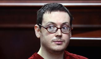 In this Aug. 24, 2015, file photo, James Holmes appears in court for the sentencing phase in his trial at Arapahoe County District Court in Centennial, Colo. (RJ Sangosti/The Denver Post via AP, Pool, File)