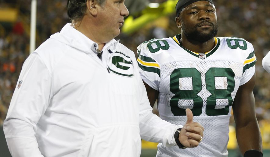 Green Bay Packers' Ty Montgomery walks to the locker room after an injury during the first half of an NFL football game against the Chicago Bears Thursday, Sept. 28, 2017, in Green Bay, Wis. (AP Photo/Matt Ludtke)