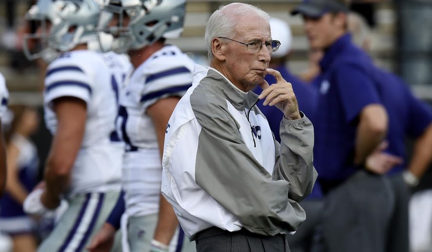 FILE - In this Sept. 16, 2017, file photo, Kansas State coach Bill Snyder watches as players warm up for an NCAA college football game against Vanderbilt in Nashville, Tenn. For the first time in the Big 12, Kansas State will play all of its conference games in consecutive weeks. (AP Photo/Mark Zaleski, File)