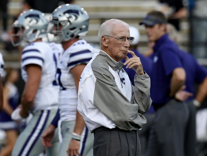 FILE - In this Sept. 16, 2017, file photo, Kansas State coach Bill Snyder watches as players warm up for an NCAA college football game against Vanderbilt in Nashville, Tenn. For the first time in the Big 12, Kansas State will play all of its conference games in consecutive weeks. (AP Photo/Mark Zaleski, File)