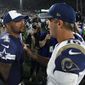 FILE - In this Aug. 13, 2016, file photo, Los Angeles Rams quarterback Jared Goff, right, is greeted by Dallas Cowboys quarterback Dak Prescott, left, after a preseason NFL football game in Los Angeles. Te second-year quarterbacks are set to face each other Sunday on Prescott’s home field with Goff off to the better start for the surprising Rams. (AP Photo/Mark J. Terrill, File)