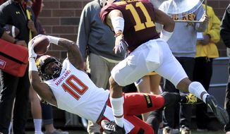 Maryland wide receiver D.J. Turner (10) makes a diving catch in front of Minnesota safety Antoine Winfield Jr. (11) on fourth down in the first quarter of an NCAA college football game on Saturday, Sept. 30, 2017, in Minneapolis.(AP Photo/Andy Clayton-King)