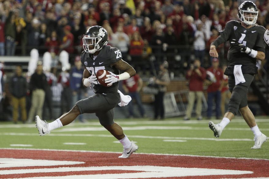 Washington State running back Jamal Morrow (25) runs for a touchdown during the first half of an NCAA college football game against Southern California in Pullman, Wash., Friday, Sept. 29, 2017. (AP Photo/Young Kwak)