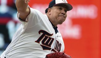 Minnesota Twins pitcher Bartolo Colon pitches to the Detroit Tigers in the first inning of a baseball game, Sunday October 1, 2017, in Minneapolis. (AP Photo/John Autey)