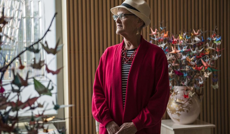 In this Sept. 18, 2017 photo, Teri Giangreco, of Vancouver, who was diagnosed with ovarian cancer in January and is still undergoing treatment stands for a portrait at Salmon Creek Medical Center in Vancouver, Wash. Giangreco didn't know the warning signs of ovarian cancer until after her diagnosis, so she's teamed up with Legacy Salmon Creek Medical Center and the Ovarian Cancer Alliance of Oregon and Southwest Washington to spread the word about signs and symptoms. (Alisha Jucevic/The Columbian via AP)
