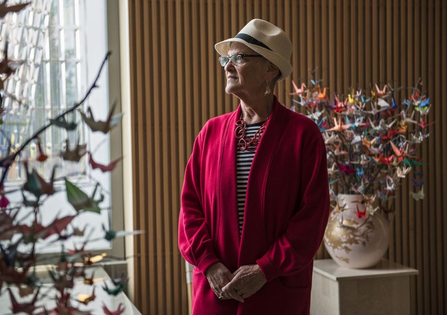 In this Sept. 18, 2017 photo, Teri Giangreco, of Vancouver, who was diagnosed with ovarian cancer in January and is still undergoing treatment stands for a portrait at Salmon Creek Medical Center in Vancouver, Wash. Giangreco didn't know the warning signs of ovarian cancer until after her diagnosis, so she's teamed up with Legacy Salmon Creek Medical Center and the Ovarian Cancer Alliance of Oregon and Southwest Washington to spread the word about signs and symptoms. (Alisha Jucevic/The Columbian via AP)