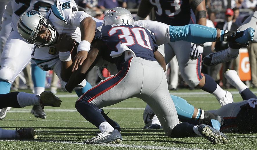 Carolina Panthers quarterback Cam Newton dives for a touchdown past New England Patriots safety Duron Harmon (30) during the second half of an NFL football game, Sunday, Oct. 1, 2017, in Foxborough, Mass. (AP Photo/Steven Senne)