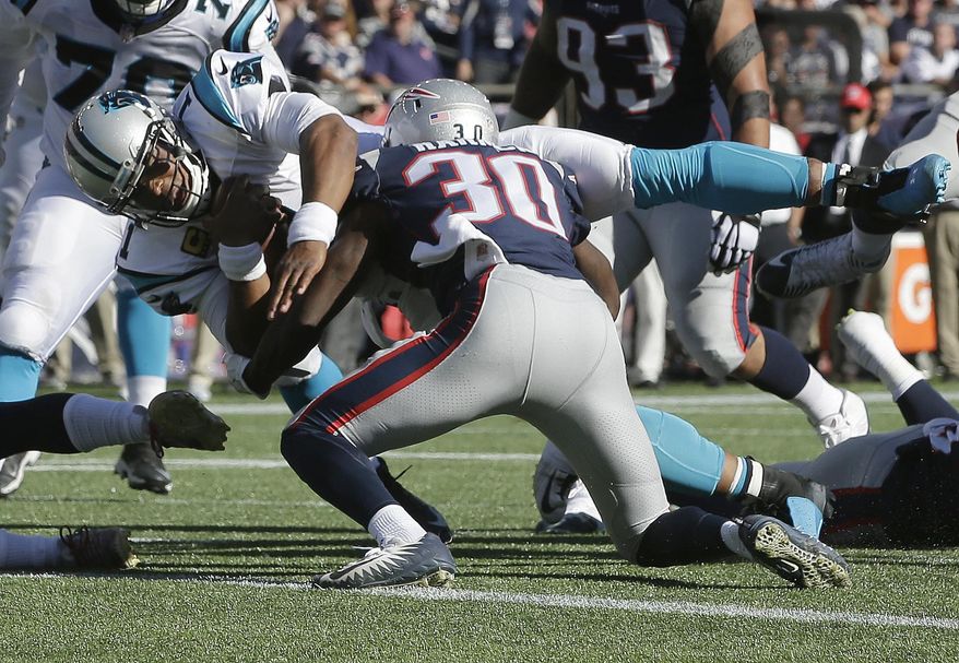 Carolina Panthers quarterback Cam Newton dives for a touchdown past New England Patriots safety Duron Harmon (30) during the second half of an NFL football game, Sunday, Oct. 1, 2017, in Foxborough, Mass. (AP Photo/Steven Senne)