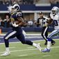 Los Angeles Rams running back Todd Gurley (30) sprints to the end zone past Dallas Cowboys cornerback Anthony Brown, right, for a touchdown in the second half of an NFL football game, Sunday, Oct. 1, 2017, in Arlington, Texas. (AP Photo/Michael Ainsworth)