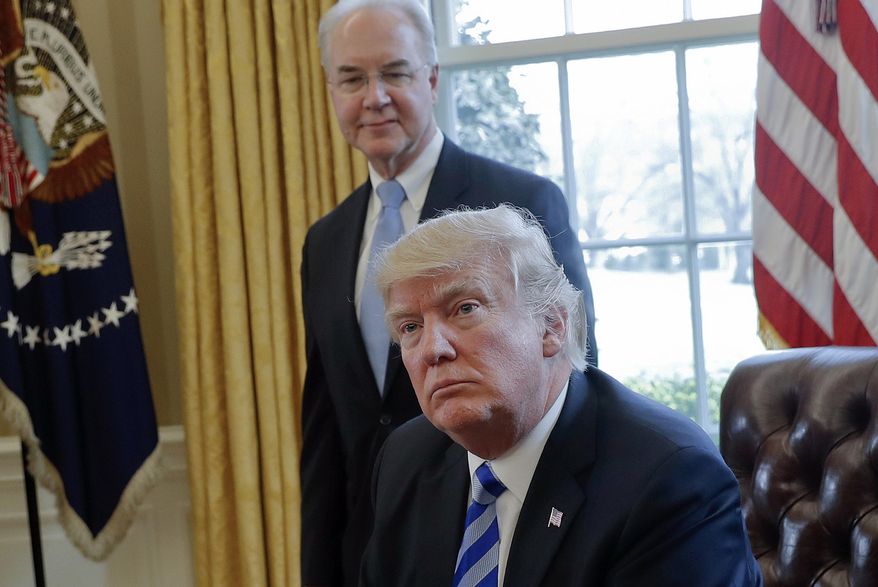 FILE - In this March 24, 2017 file photo, President Donald Trump with Health and Human Services Secretary Tom Price are seen in the Oval Office of the White House in Washington. Price resigned Sept. 29, after his costly travel triggered investigations that overshadowed the administration's agenda and angered his boss. Price's regrets and partial repayment couldn't save his job. (AP Photo/Pablo Martinez Monsivais, File)