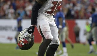 Tampa Bay Buccaneers defensive back Robert McClain (36) celebrates after the team defeated the New York Giants 25-23 during an NFL football game Sunday, Oct. 1, 2017, in Tampa, Fla. (AP Photo/Phelan Ebenhack)