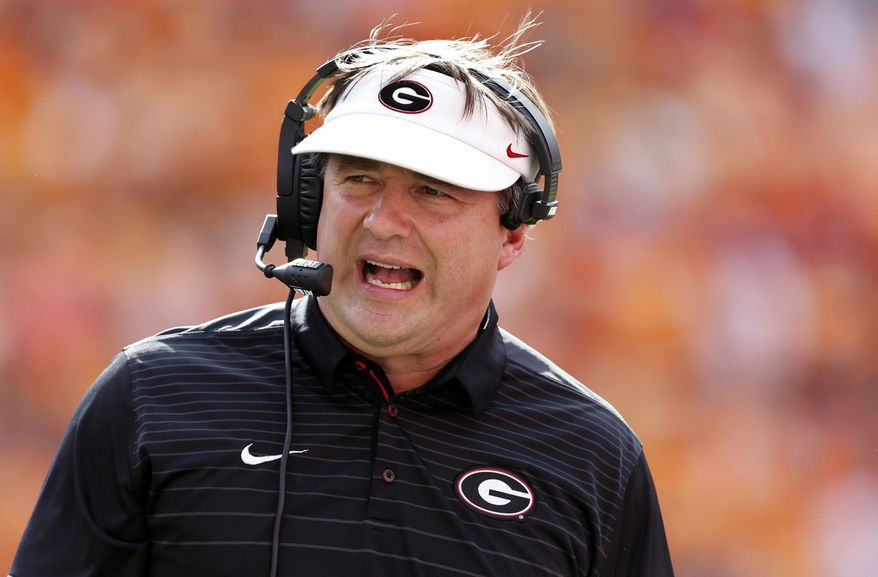 FILE - In this Saturday, Sept. 30, 2017, file photo, Georgia head coach Kirby Smart reacts during the first half of an NCAA college football game against Tennessee, in Knoxville, Tenn. Coach Smart is trying to level excitement as his unbeaten team keeps moving higher in the poll. The No. 5 Bulldogs are back at practice two days after a blowout win at Tennessee, and he wants fans to know that his team is far from perfect. (AP Photo/Wade Payne, File)