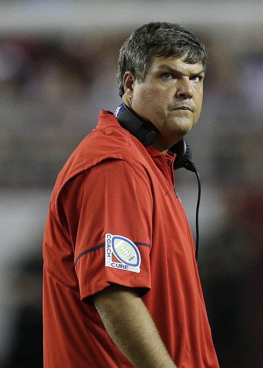 Mississippi head coach Matt Luke looks at the scoreboard during the first half of an NCAA college football game Alabama, Saturday, Sept. 30, 2017, in Tuscaloosa, Ala. (AP Photo/Brynn Anderson)