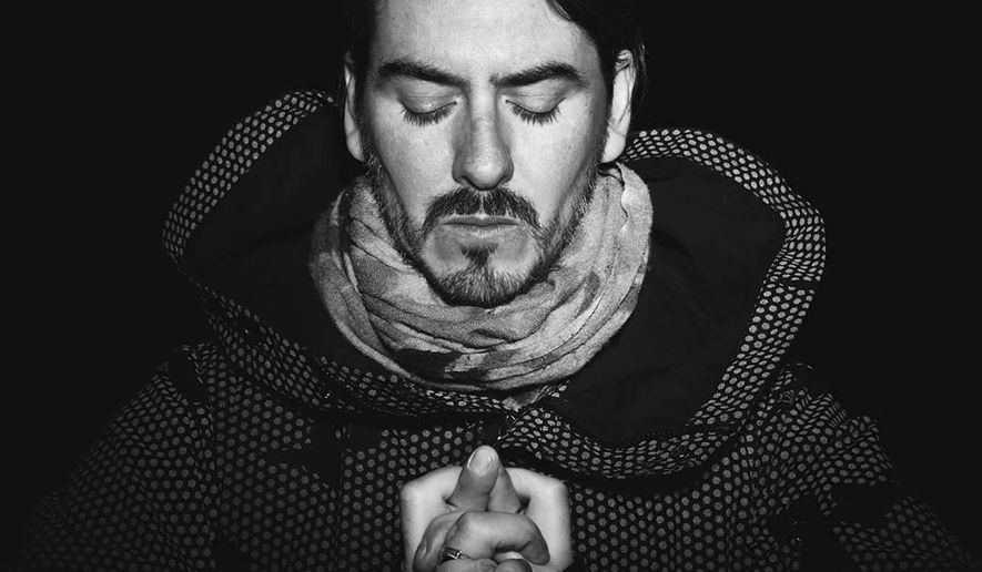 This cover image released by BMG shows "In///Parallel," the latest release by Dhani Harrison. (BMG via AP)