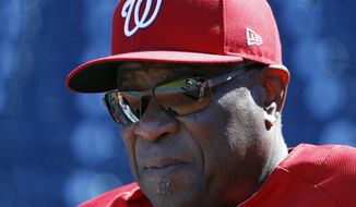 Washington Nationals manager Dusty Baker keeps his eye on practice at Nationals Park, Tuesday, Oct. 3, 2017, in Washington. Game 1 of the National League Division Series against the Chicago Cubs is Friday. (AP Photo/Alex Brandon)