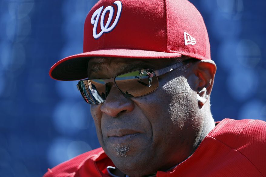 Washington Nationals manager Dusty Baker keeps his eye on practice at Nationals Park, Tuesday, Oct. 3, 2017, in Washington. Game 1 of the National League Division Series against the Chicago Cubs is Friday. (AP Photo/Alex Brandon)