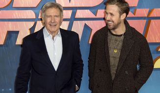 FILE - In this Sept. 21, 2017 file photo, actors Harrison Ford, left, and Ryan Gosling pose for photographers during the photo call for &amp;quot;Blade Runner 2049&amp;quot; in London. The two actors go head to head in “Blade Runner 2049,” a sequel to Ridley Scott’s 1982 cult classic with Ford reprising his role as Rick Deckard. The film is directed by Oscar-nominee Denis Villeneuve and hits theaters Friday. (Photo by Joel Ryan/Invision/AP. File)