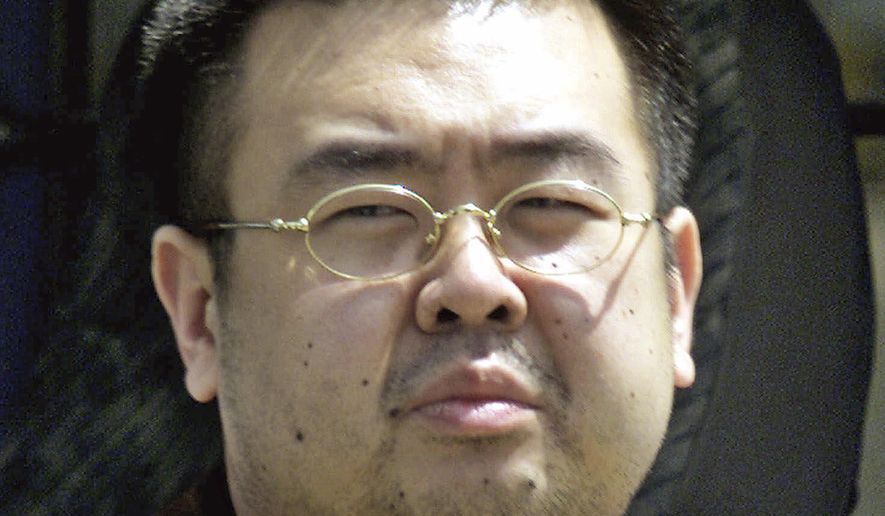 FILE - This May 4, 2001, file photo shows Kim Jong Nam, exiled half brother of North Korea's leader Kim Jong Un, in Narita, Japan. The trial of two women accused of poisoning the estranged half brother of North Korea's ruler is scheduled to begin Monday, Oct. 2, 2017, in Malaysia's High Court, nearly eight months after the brazen airport assassination. Siti Aisyah of Indonesia and Doan Thi Huong of Vietnam are suspected of smearing Kim Jong Nam's face with the banned VX nerve agent on Feb. 13 at a crowded airport terminal in Kuala Lumpur, killing him within about 20 minutes. The women say they thought they were playing a harmless prank for a hidden-camera show.(AP Photo/Shizuo Kambayashi, File)