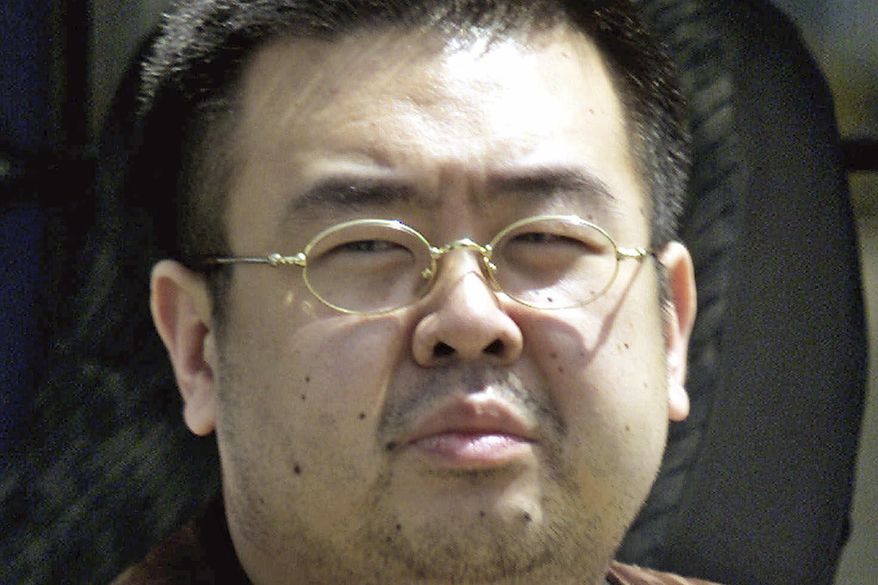 FILE - This May 4, 2001, file photo shows Kim Jong Nam, exiled half brother of North Korea's leader Kim Jong Un, in Narita, Japan. The trial of two women accused of poisoning the estranged half brother of North Korea's ruler is scheduled to begin Monday, Oct. 2, 2017, in Malaysia's High Court, nearly eight months after the brazen airport assassination. Siti Aisyah of Indonesia and Doan Thi Huong of Vietnam are suspected of smearing Kim Jong Nam's face with the banned VX nerve agent on Feb. 13 at a crowded airport terminal in Kuala Lumpur, killing him within about 20 minutes. The women say they thought they were playing a harmless prank for a hidden-camera show.(AP Photo/Shizuo Kambayashi, File)