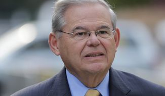FILE - In this Sept. 6, 2017, file photo, Sen. Bob Menendez arrives to court for his federal corruption trial in Newark, N.J.  A basic question has arisen in the bribery trial of Menendez that could prove significant when jurors start to deliberate: What is a constituent? Defense attorneys have argued that co-defendant Salomon Melgen can be considered a constituent of Menendez&#x27;s even though Melgen lives in Florida and Menendez represents New Jersey. (AP Photo/Seth Wenig, File)