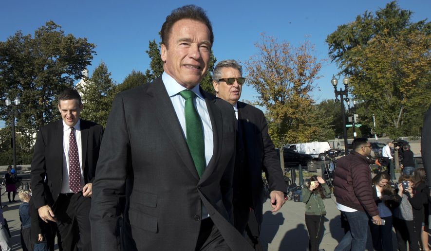 Former California Gov. Arnold Schwarzenegger, arrives at the U.S. Supreme Court in Washington, Tuesday, Oct. 3, 2017. (AP Photo/Manuel Balce Ceneta)