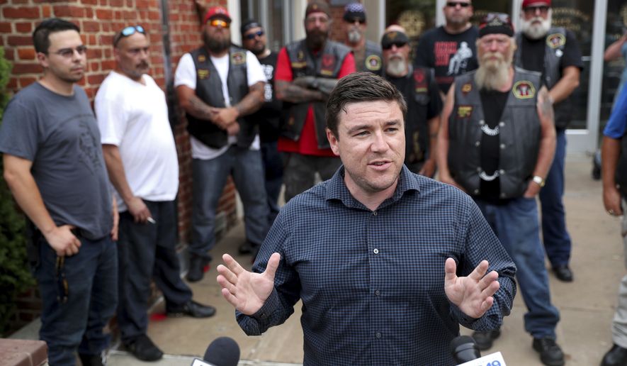 In a July 11, 2017, file photo, Jason Kessler speaks at a press conference with members of the Warlocks Motorcycle Club outside the Charlottesville Police Department in Charlottesville,, Va. (Ryan M. Kelly/The Daily Progress via AP)