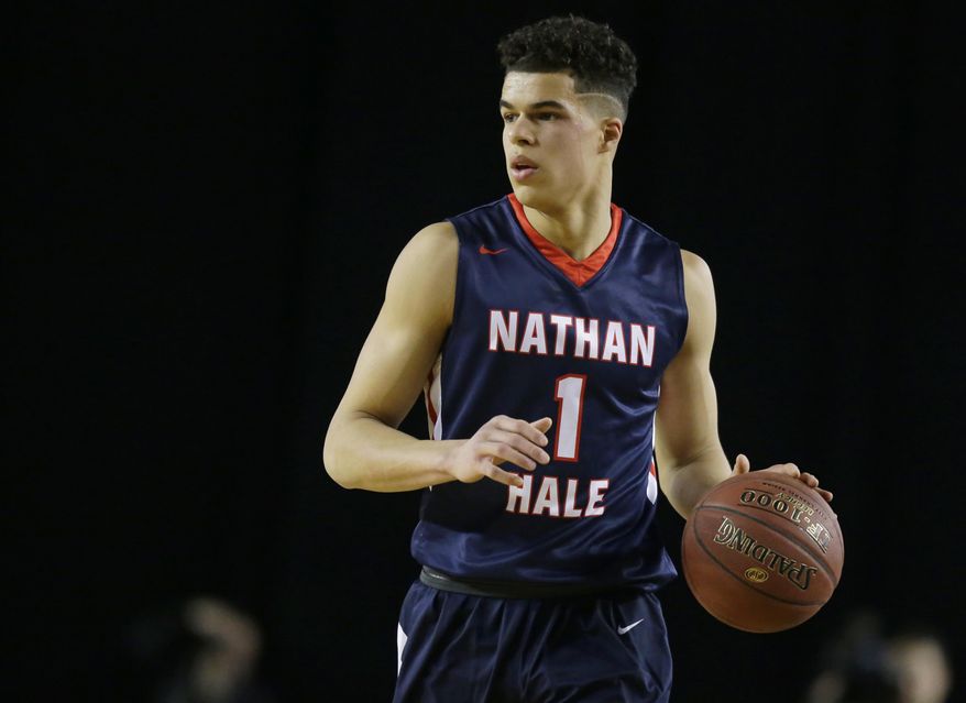 FILE - In this March 4, 2017, file photo, Nathan Hale forward Michael Porter Jr. dribbles downcourt against Garfield in the first half of the Washington state boys 3A high school basketball championship in Tacoma, Wash. Missouri basketball has been mired in Southeastern Conference irrelevance in recent years under former coach Kim Anderson. No more for the resurgent Tigers, who have national-championship hopes following the hiring of coach Cuonzo Martin after last season and the signing of a Kentucky-like group of freshmen _ highlighted by forward Michael Porter Jr. (AP Photo/Ted S. Warren, File)