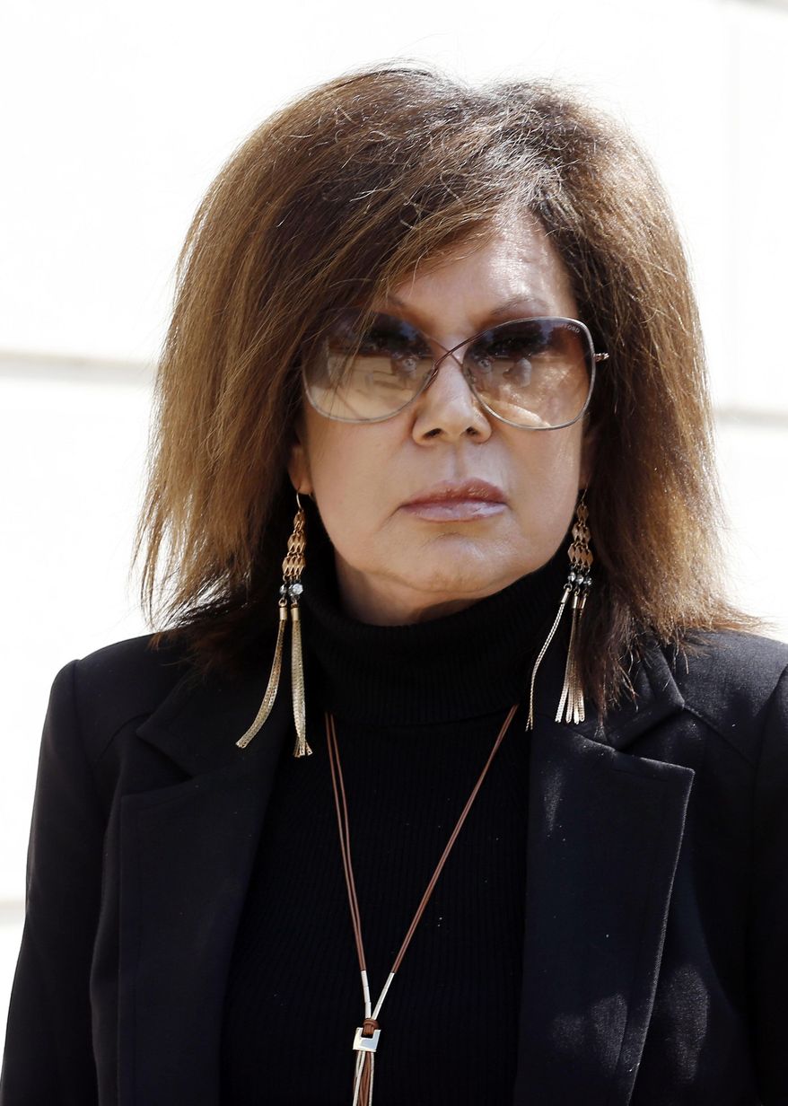 FILE - In this Aug. 3, 2016, file photo, Teresa Malone, leaves the federal courthouse in Jackson, Miss., after pleading not guilty to federal charges she made regular payments to then state corrections head, Christopher Epps, over nearly four years. On Wednesday, Oct. 4, 2017, Malone entered guilty pleas to conspiracy and bribery charges that she paid kickbacks to the state's former corrections commissioner. (AP Photo/Rogelio V. Solis, File)