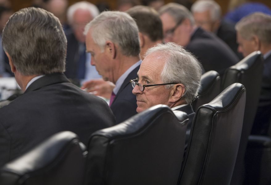 Sen. Bob Corker, Tennessee Republican, voted to advance the budget through committee but said he plans to oppose any plan that adds even one penny to the deficit. (Associated Press)