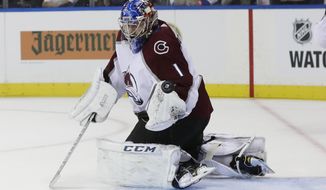 Colorado Avalanche goalie Semyon Varlamov (1) stops a shot on the goal during the second period of an NHL hockey game against the New York Rangers Thursday, Oct. 5, 2017, in New York. (AP Photo/Frank Franklin II)