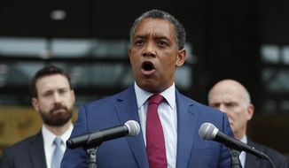 District of Columbia Attorney General Karl Racine, joined by from left, District of Columbia Council member Charles Allen and District of Columbia Council Chairman Phil Mendelson, speaks at One Judiciary Square in Washington, Thursday, Oct. 5, 2017. District of Columbia officials say they won&#39;t appeal a court ruling against a strict city gun law, setting the stage for it to become easier for gun owners to get concealed carry permits in the city. City officials announced their decision not to take the case to the Supreme Court. (AP Photo/Carolyn Kaster) **FILE**
