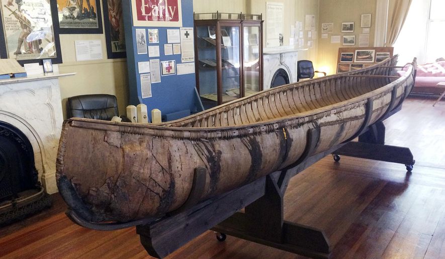 One of the oldest-known Native American birch-bark canoes, dated from the mid-1700's, is displayed at the Pejepscot Museum & Research Center in Brunswick, Maine, Thursday Oct. 5, 2017. The society came into the possession of it in 1889. It had spent three decades in a barn before being placed in the museum. (AP Photo/Patrick Whittle)