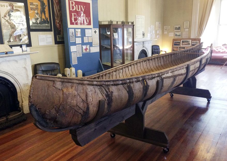 One of the oldest-known Native American birch-bark canoes, dated from the mid-1700's, is displayed at the Pejepscot Museum & Research Center in Brunswick, Maine, Thursday Oct. 5, 2017. The society came into the possession of it in 1889. It had spent three decades in a barn before being placed in the museum. (AP Photo/Patrick Whittle)