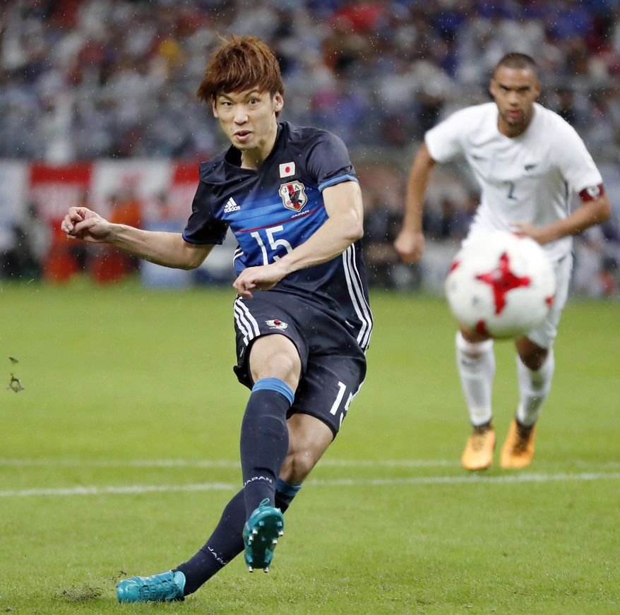Japan's Yuya Osako scores a goal in the last half during a friendly soccer match against New Zealand in Toyota, central Japan Friday, Oct. 6, 2017. (Yohei Kanesashi/Kyodo News via AP)