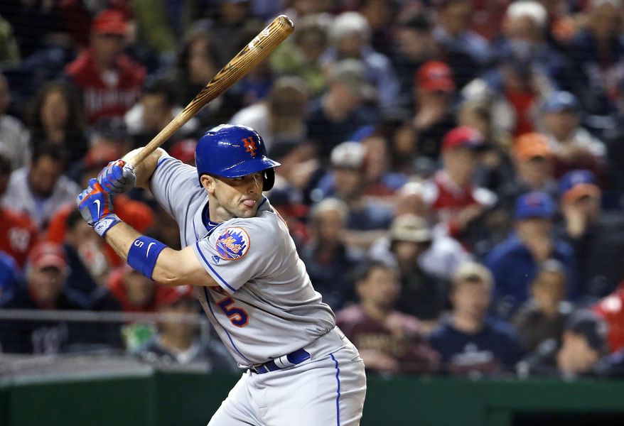 FILE - In this May 23, 2016, file photo, New York Mets' David Wright bats during the fifth inning of a baseball game against the Washington Nationals at Nationals Park in Washington. Wright underwent back surgery, his second operation in a month as he tries to return to the major leagues after an absence of 1 1/2 years. The team said Thursday, Oct. 5, 2017, that Wright had a procedure in Los Angeles called a laminotomy, which is a treatment for nerve compression in the spinal canal. (AP Photo/Alex Brandon, File)