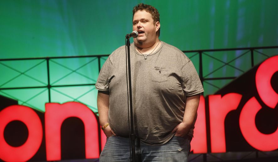 FILE - In this June 13, 2015 file photo, Ralphie May performs at the 2015 Bonnaroo Music and Arts Festival in Manchester, Tenn. A spokeswoman for Ralphie May says the comedian has died at age 45. In a statement Friday, Oct. 6, 2017, publicist Stacey Pokluda said May died of cardiac arrest. She said he had been fighting pneumonia, which caused him to cancel a few appearances in the past month. (Photo by John Davisson/Invision/AP, File)