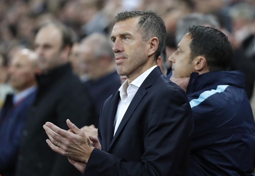 Slovenia coach Srecko Katanec applauds during the World Cup Group F qualifying soccer match between England and Slovenia at Wembley stadium in London, Thursday, Oct. 5, 2017. (AP Photo/Kirsty Wigglesworth)