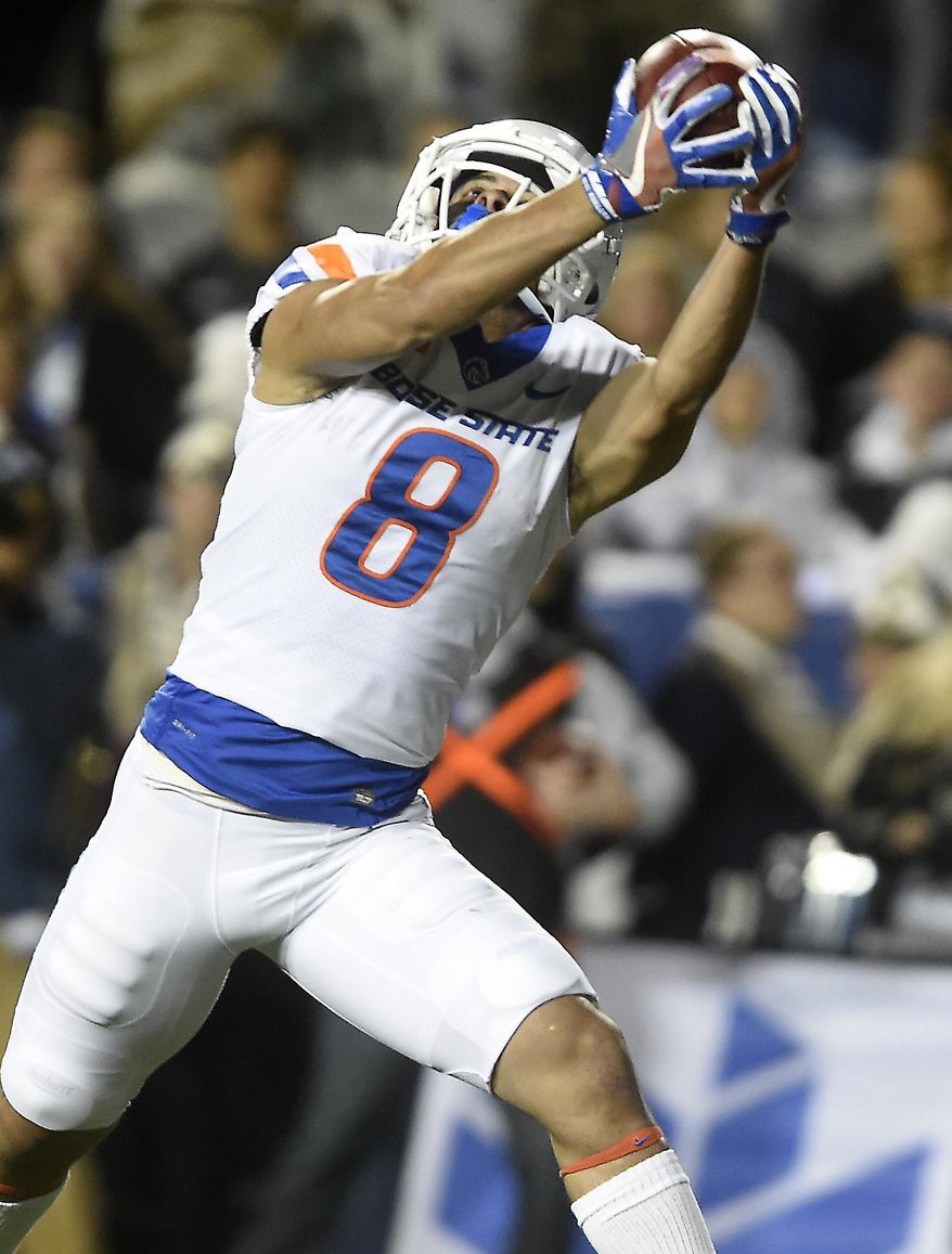 Boise State's Sean Modster pulls in a touchdown reception during the second quarter against BYU during an NCAA college football game Friday, Oct. 6, 2017, in Provo, Utah. (Drew Nash/The Times-News via AP)