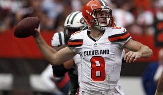 Cleveland Browns quarterback Kevin Hogan passes during the second half of an NFL football game against the New York Jets, Sunday, Oct. 8, 2017, in Cleveland. (AP Photo/Ron Schwane)