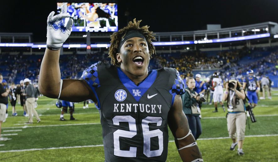 Kentucky running back Benny Snell Jr. celebrates as he leaves the field after an NCAA college football game against Missouri Saturday, Oct. 7, 2017, in Lexington, Ky. Kentucky won the game 40-34. (AP Photo/David Stephenson)