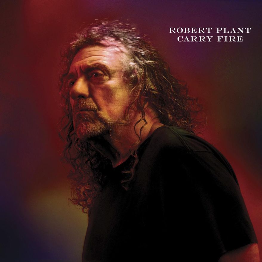 This cover image released by Nonesuch/Warner Bros shows "Carry Fire," the latest release by Robert Plant. (Nonesuch/Warner Bros via AP)