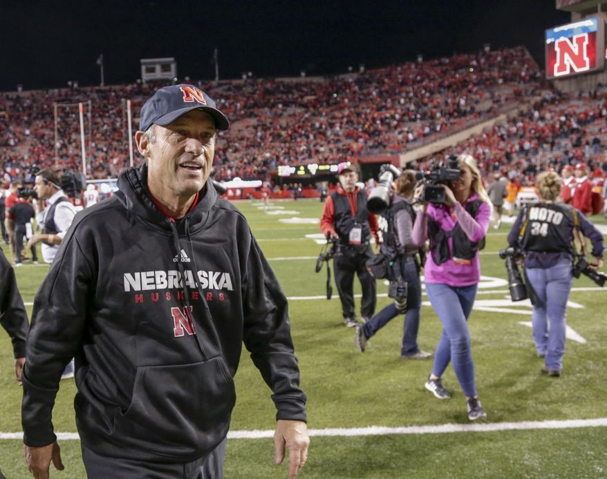 Nebraska head coach Mike Riley walks off the field following an NCAA college football game against Wisconsin in Lincoln, Neb., Saturday, Oct. 7, 2017. Wisconsin won 38-17. (AP Photo/Nati Harnik)