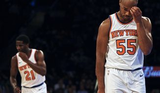 New York Knicks Jarrett Jack, right, reacts during the second half of a preseason NBA basketball game against Houston Rockets at Madison Square Garden in New York, Monday, Oct. 9, 2017. (AP Photo/Andres Kudacki)