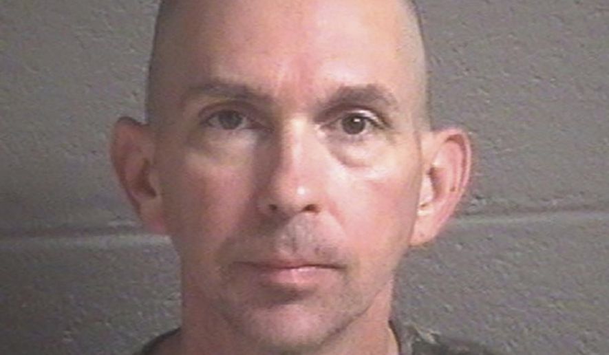 This undated photo provided by the Buncombe County Detention Center shows Michael Christopher Estes, who’s accused of planting an improvised explosive device at the airport on Friday, Oct. 6, 2017, in Asheville, N.C. A criminal complaint in federal court accuses Estes of attempted malicious use of explosive materials and unlawful possession of explosives at the airport. (Buncombe County Detention Center via AP)
