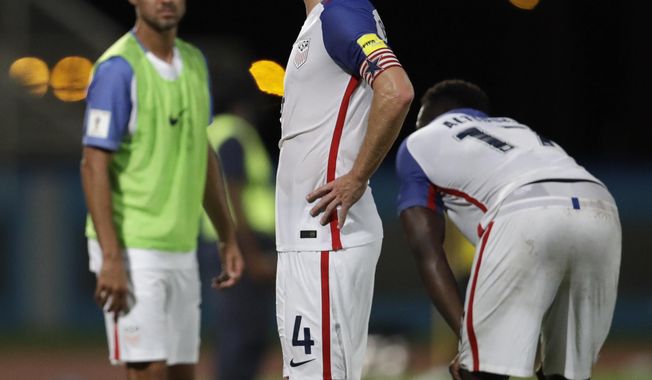 United States&#x27; Michael Bradley, reacts after losing 2-1 against Trinidad and Tobago during a 2018 World Cup qualifying soccer match  in Couva, Trinidad, Tuesday, Oct. 10, 2017. (AP Photo/Rebecca Blackwell)