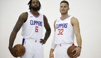 FILE - In this Sept. 25, 2017, file photo, Los Angeles Clippers&#x27; DeAndre Jordan, left, and Blake Griffin pose for photos during an NBA basketball media day, in Los Angeles.  With Chris Paul newly relocated to Houston, it&#x27;s up to Griffin and Jordan to lead an overhauled Clippers roster deeper into the playoffs. (AP Photo/Jae C. Hong, File)