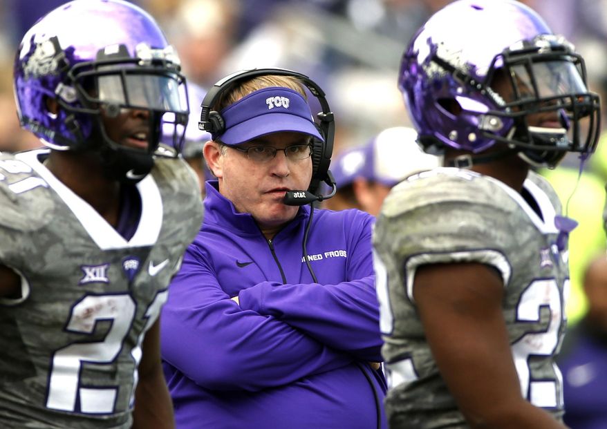 FILE - In this Nov. 14, 2015, file photo, TCU head coach Gary Patterson looks on from the sidelines during the second half of an NCAA college football game against Kansas in Fort Worth, Texas. Among the unbeaten teams, No. 6 TCU looks to have the toughest test, going on the road to play Kansas State on Saturday. (AP Photo/Ron Jenkins, File)